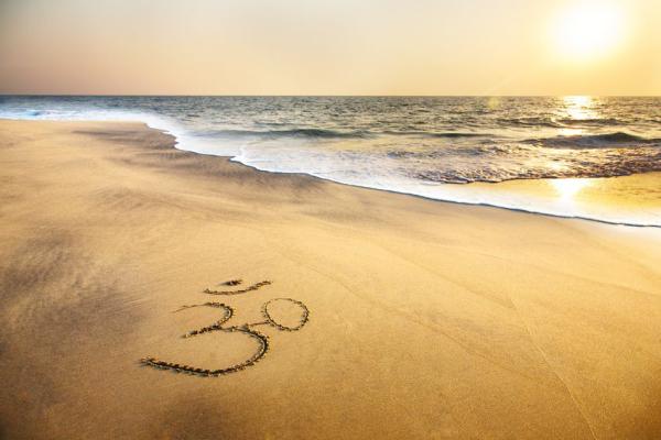 Stand med solnedgang